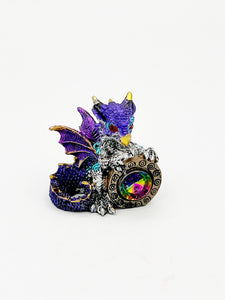 Dragon holding gem