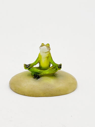 Meditating yoga frog
