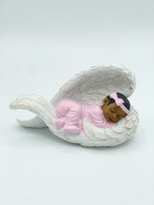 Baby in angel wings