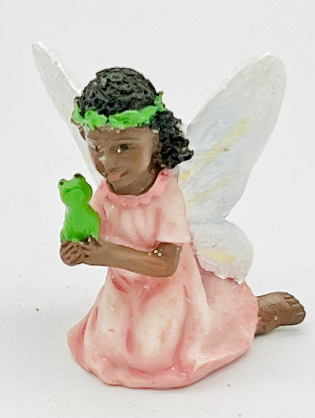Fairy holding a frog